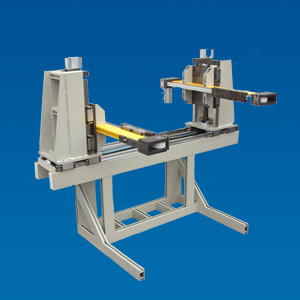 Combined load fixture from toothed belts and spindle axes for fast and precise loading of test machines